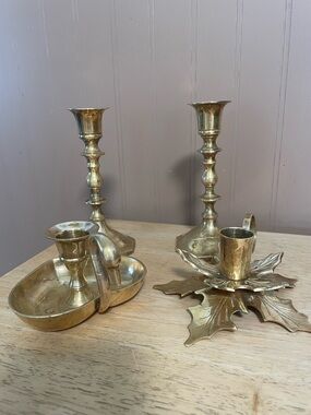 Collection of 4 solid brass taper candle holders, 2 stands, 1 leaf. I heart swan